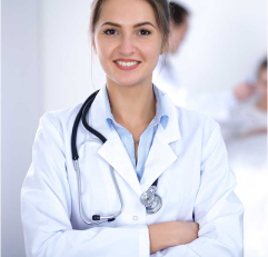 a female doctor standing with a stethoscope